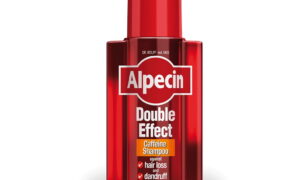 شامپو ضد شوره و تقویت کننده آلپسین مدل Double Effect Caffeine در بسته‌بندی 200 میلی لیتر، مناسب برای کاهش شوره و تقویت مو با فرمول کافئین.